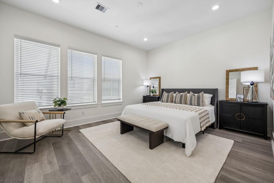 The primary bedroom is a restful oasis with dual walk in closets and plenty of natural light. The primary bedroom is a restful oasis with dual walk in closets and plenty of natural light.