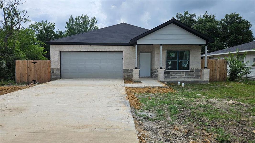 Front exterior of a new home in , Terrell, TX, highlighting curb appeal (Image 14). Front exterior of a new home in , Terrell, TX, highlighting curb appeal (Image 14).