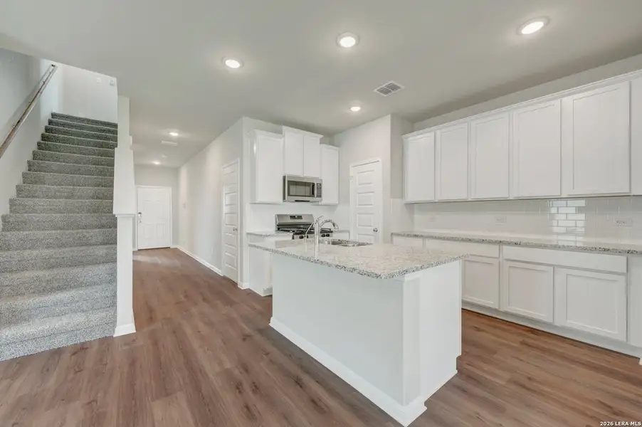 Furnished interior view inside a new home in Mesquite Ridge, San Antonio (Image 17).