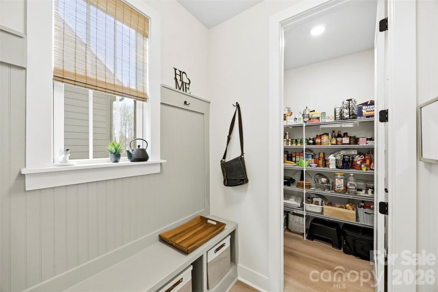 Main level drop zone into walk in pantry. Main level drop zone into walk in pantry.