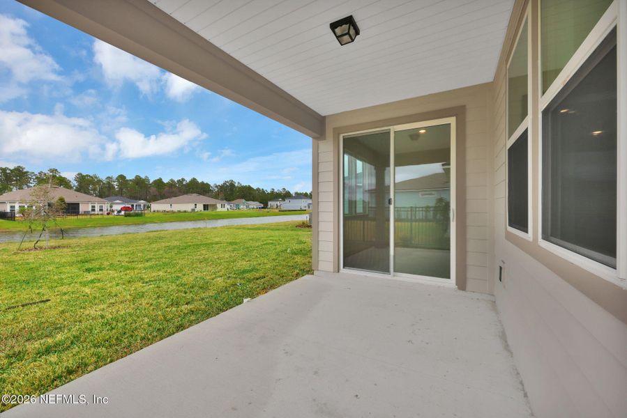 Exterior details and patio area of a home in Hyland Trail, Green Cove Springs (Image 20).