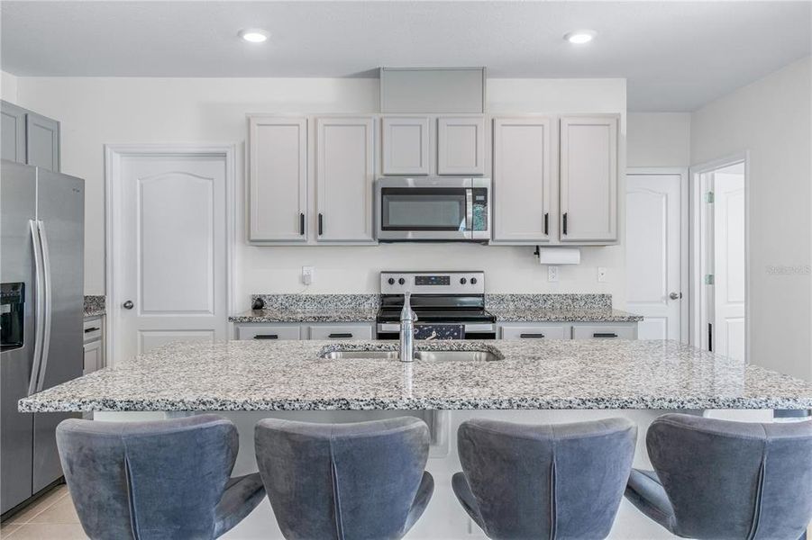 Furnished interior view inside a new home in Eagle Hammock, Eagle Lake (Image 24).