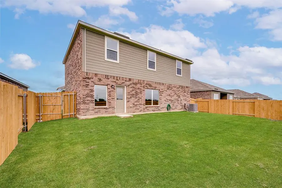 Exterior details and patio area of a home in Patriot Estates, Venus (Image 3).