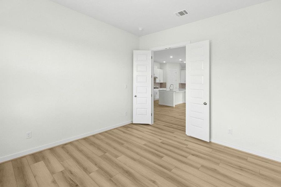 Spacious, unfurnished interior of a new home in The Colony, Bastrop (Image 11).