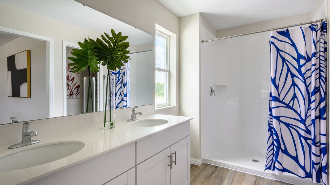 Representative furnished interior of a home built from the Indigo by Casa Fresca Homes in Crosswinds, Haines City (Image 14).