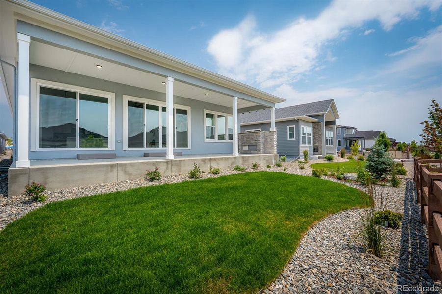 Front exterior of a new home in Wolf Ranch - Enclave Collection, Colorado Springs, CO, highlighting curb appeal (Image 2).