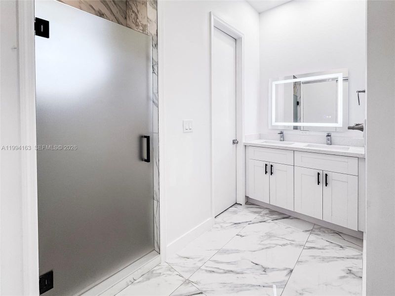 Furnished interior view inside a new home in , Port St. Lucie (Image 13).