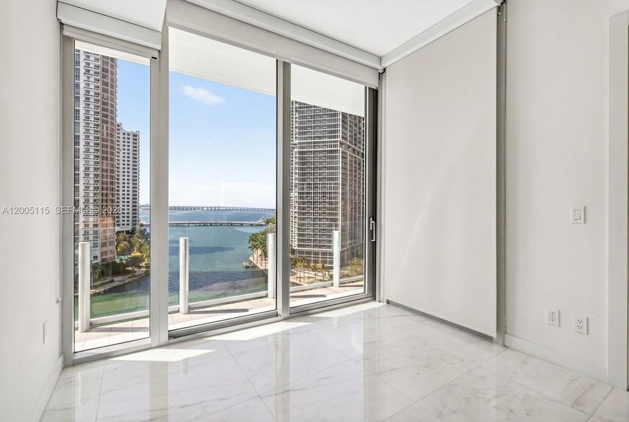 Spacious, unfurnished interior of a new home in Aston Martin Residences, Miami (Image 8).