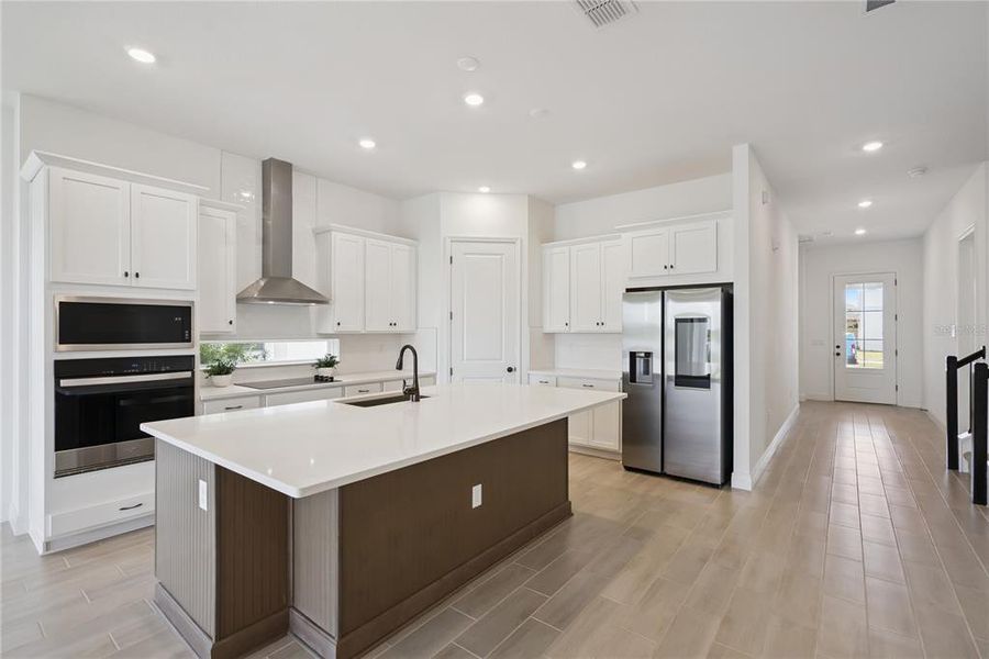 Furnished interior view inside a new home in Laureate Park, Orlando (Image 19).
