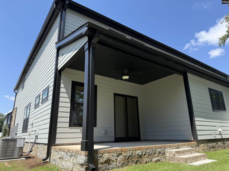 Front exterior of a new home in Dunbar Village, Cayce, SC, highlighting curb appeal (Image 25). Front exterior of a new home in Dunbar Village, Cayce, SC, highlighting curb appeal (Image 25).