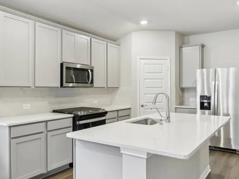 Furnished interior view inside a new home in Turner's Crossing - Reserve Collection, Buda (Image 3).