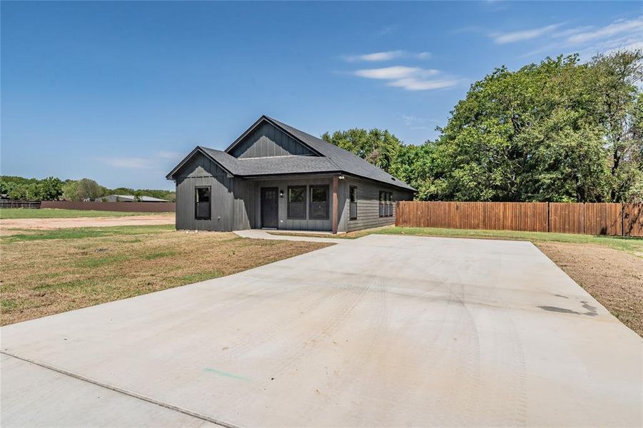 Front exterior of a new home in , Bridgeport, TX, highlighting curb appeal (Image 1). Front exterior of a new home in , Bridgeport, TX, highlighting curb appeal (Image 1).