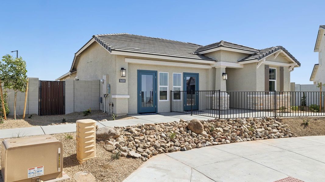 Representative exterior photo of a completed home built from the Dune by D.R. Horton in Westpark, Buckeye, AZ (Image 27).