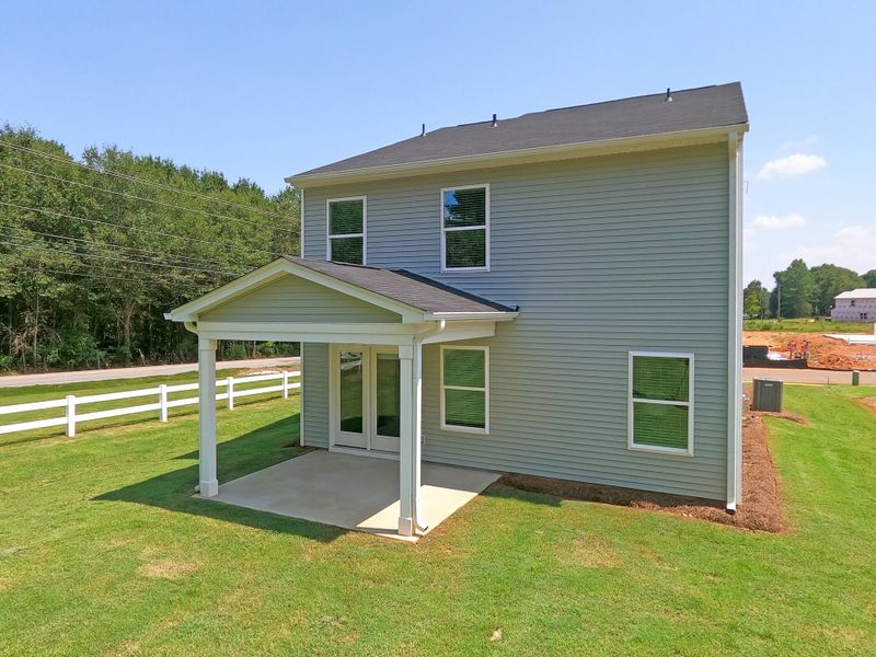Exterior details and patio area of a home in Central Creek, Goose Creek (Image 2).
