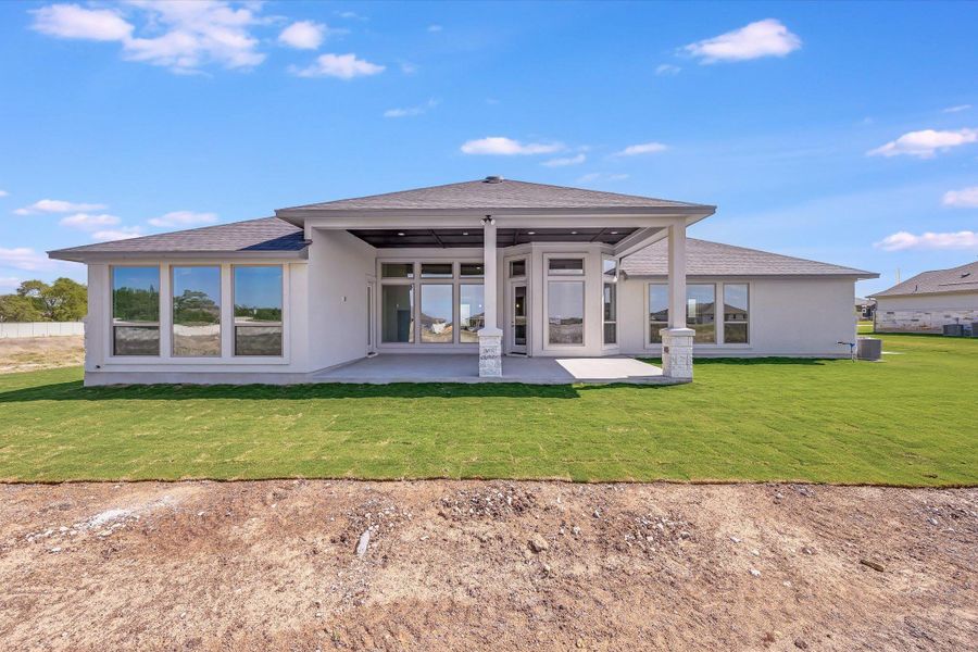Exterior details and patio area of a home in Leander Estates, Leander (Image 20).