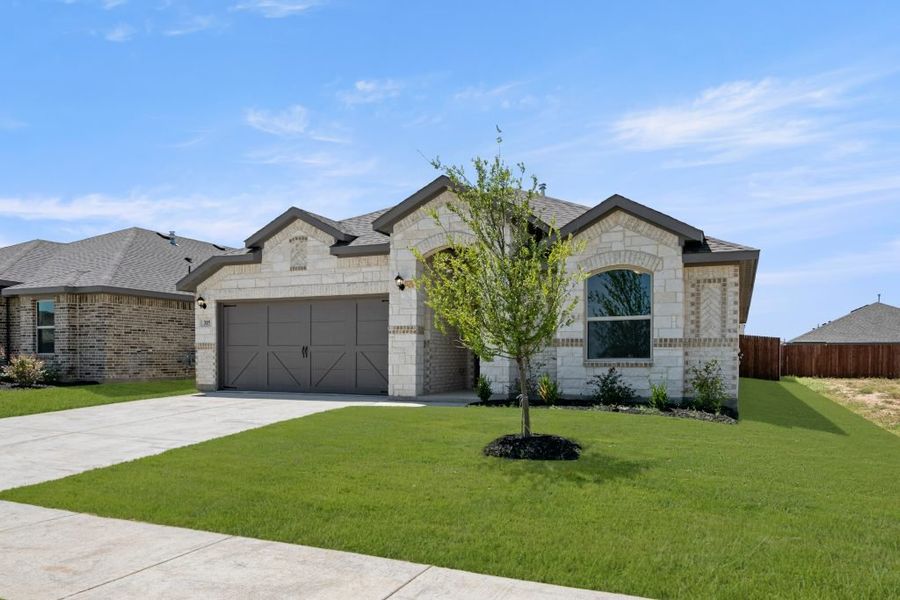 Representative exterior photo of a completed home built from the Austin by Impression Homes in Baker Farms, Cleburne, TX (Image 2).