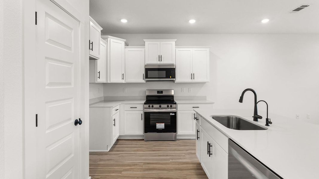 Furnished interior view inside a new home in Colonial East Townhomes, Panama City Beach (Image 5).