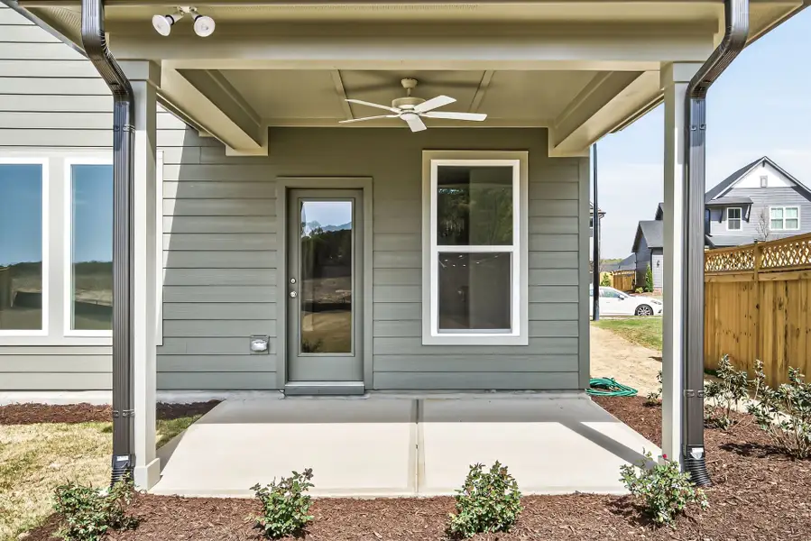 Exterior details and patio area of a home in Serenity - The Cottage Collection, Fuquay Varina (Image 4).