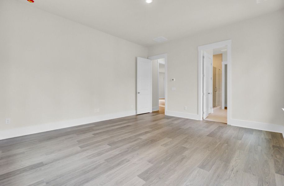 Spacious, unfurnished interior of a new home in Indigo Grove Single Family Homes, Johns Island (Image 43).