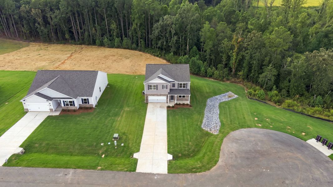 Front exterior of a new home in Beaver Dam Crossing, Bailey, NC, highlighting curb appeal (Image 17).