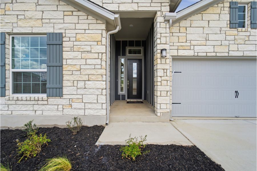 Exterior details and patio area of a home in Santa Rita Ranch, Liberty Hill (Image 3).