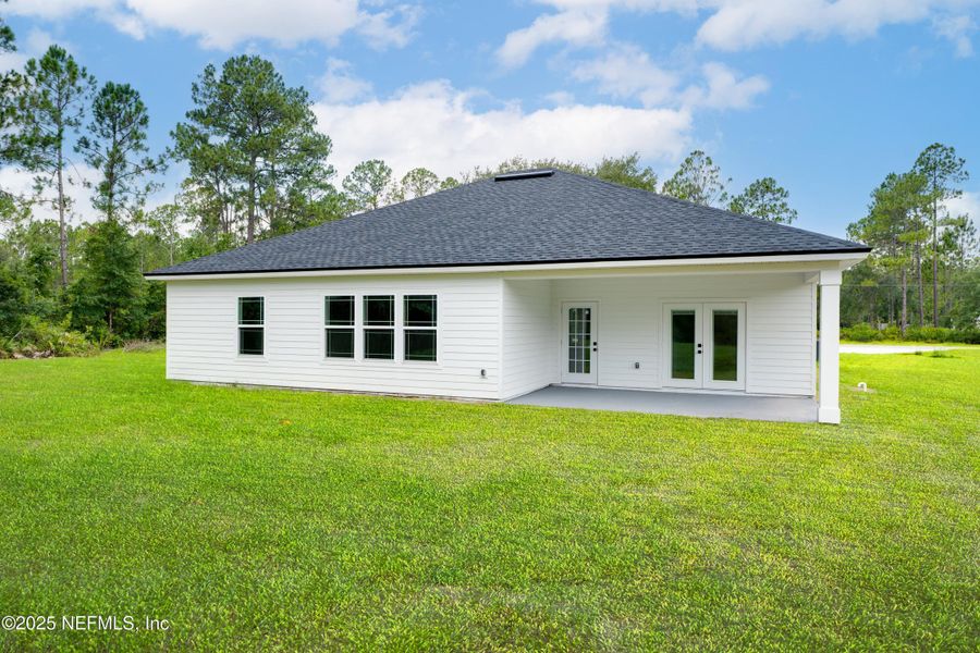 Front exterior of a new home in , Middleburg, FL, highlighting curb appeal (Image 13). Front exterior of a new home in , Middleburg, FL, highlighting curb appeal (Image 13).