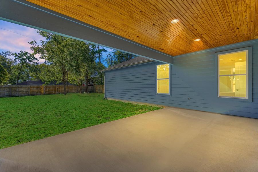 Wow! Enjoy your morning coffee or peaceful evenings under the cedar-lined covered back patio built for year-round living. Wow! Enjoy your morning coffee or peaceful evenings under the cedar-lined covered back patio built for year-round living.