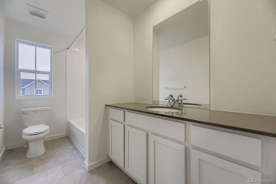 Furnished interior view inside a new home in Ken-Caryl Ranch, Littleton (Image 5).