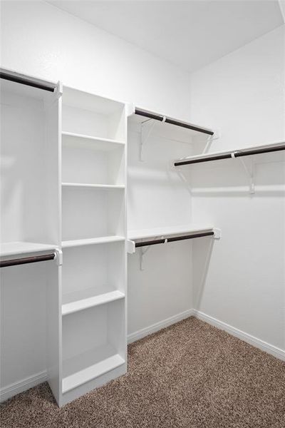 Primary walk in closet Primary walk in closet