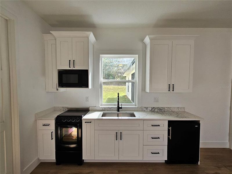 Furnished interior view inside a new home in , Brooksville (Image 13).