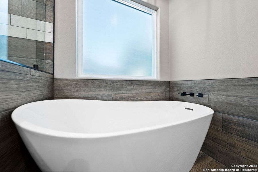 Furnished interior view inside a new home in , Kerrville (Image 32).