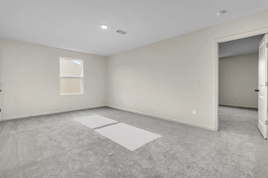 Representative unfurnished interior of a home built from the Supernova by Starlight Homes in Carmel East, Pflugerville (Image 23).