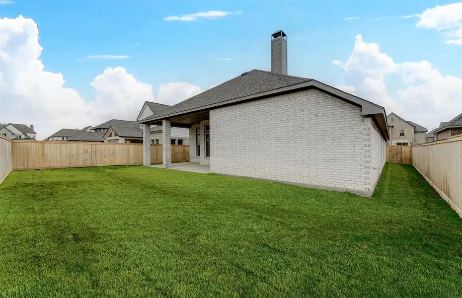 Exterior details and patio area of a home in Audubon 60', Magnolia (Image 2). Exterior details and patio area of a home in Audubon 60', Magnolia (Image 2).