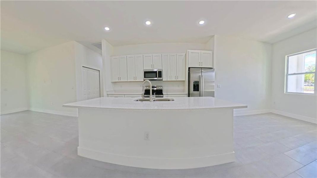 Furnished interior view inside a new home in , Dunnellon (Image 7).