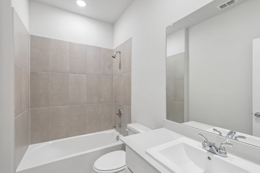 Secondary Bathroom in the Holden home plan by Trophy Signature Homes