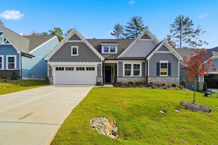 Front exterior of a new home in Rone Creek, Waxhaw, NC, highlighting curb appeal (Image 27).