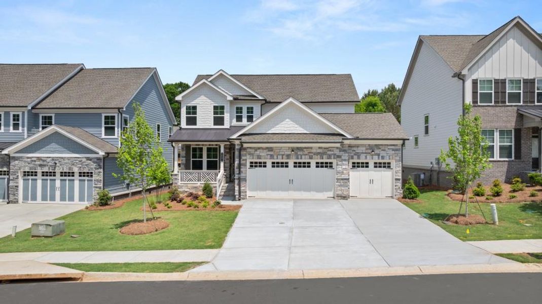 Front exterior of a new home in Willow Creek, Watkinsville, GA, highlighting curb appeal (Image 1).