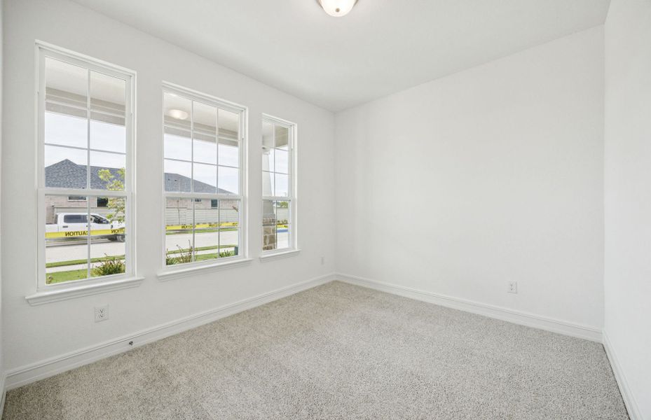 Secondary bedroom designed for comfort and convenience  *Real home pictured