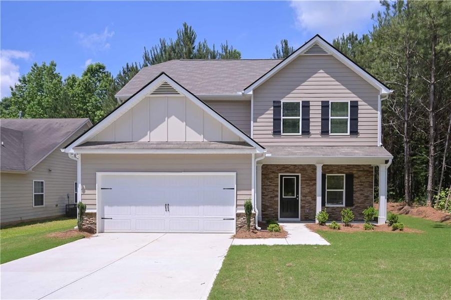 Front exterior of a new home in , Villa Rica, GA, highlighting curb appeal (Image 10).