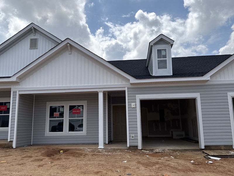 Front exterior of a new home in Windsor, North Augusta, SC, highlighting curb appeal (Image 2). Front exterior of a new home in Windsor, North Augusta, SC, highlighting curb appeal (Image 2).