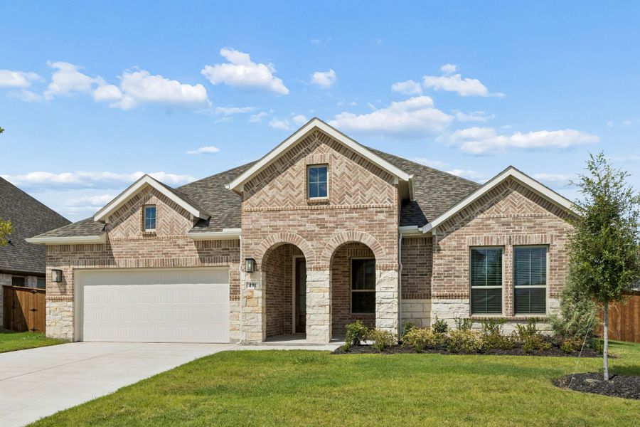Front exterior of a new home in Dove Hollow, Waxahachie, TX, highlighting curb appeal (Image 22). Front exterior of a new home in Dove Hollow, Waxahachie, TX, highlighting curb appeal (Image 22).