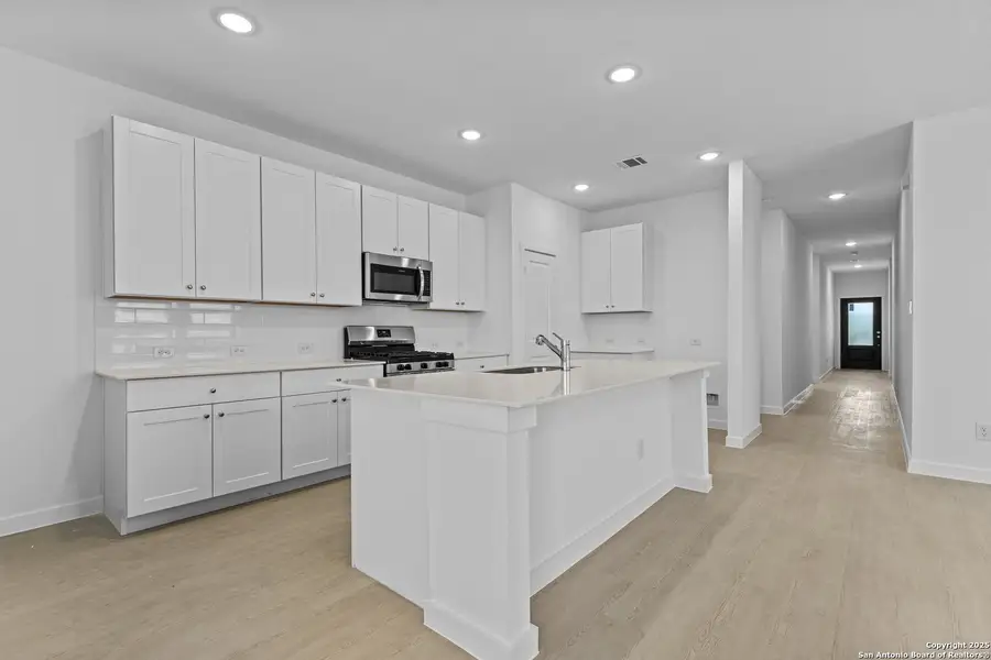Furnished interior view inside a new home in Waterwheel: Coastline Collection, San Antonio (Image 3).