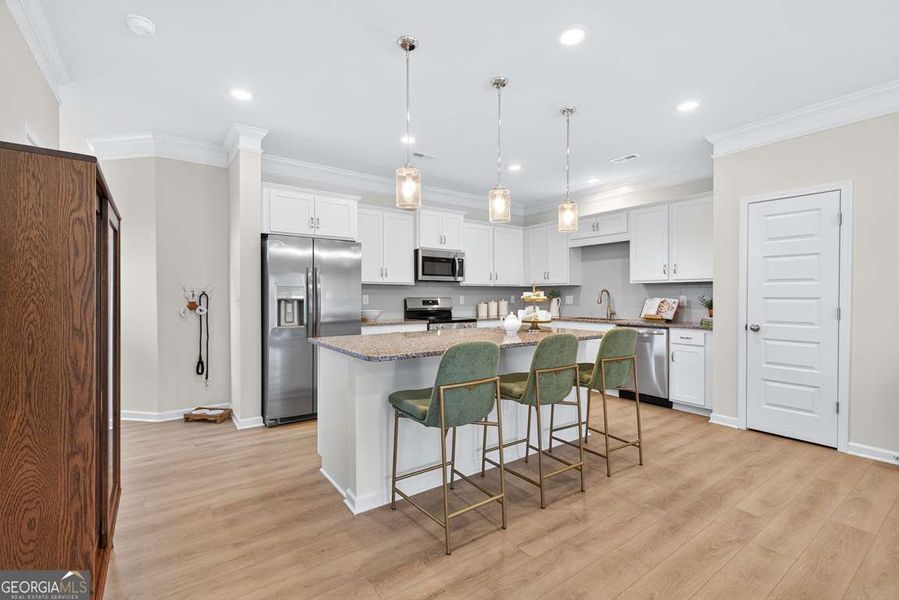 Furnished interior view inside a new home in Crescent Towns, Riverdale (Image 8).