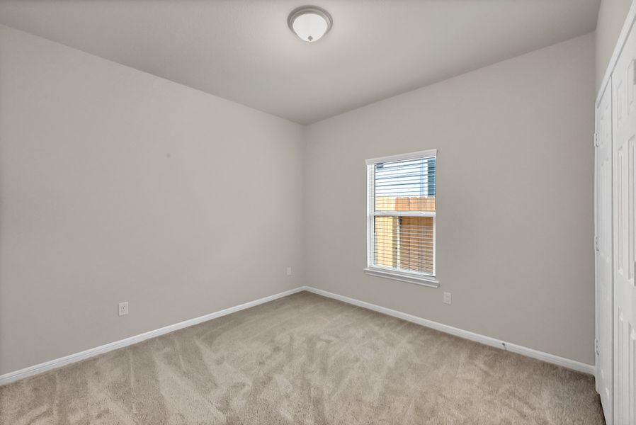 Representative unfurnished interior of a home built from the Floor Plan 1427 by Colina Homes in River Ranch, Dayton (Image 21).
