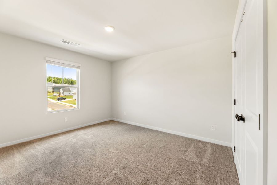 A room with a door and a window. A room with a door and a window.