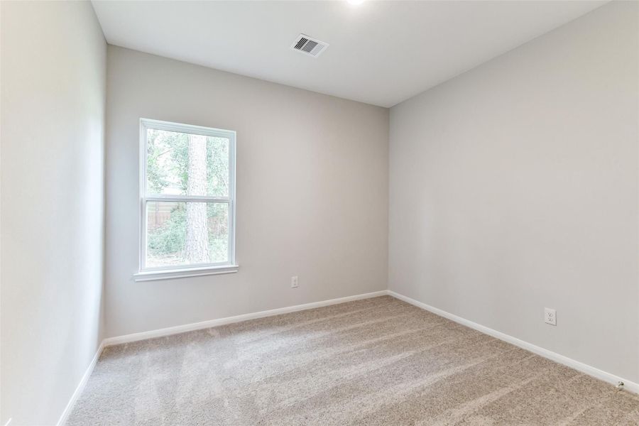 Spacious, unfurnished interior of a new home in Caney Creek Place, Conroe (Image 76).