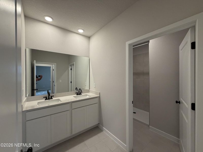 Furnished interior view inside a new home in Reserve East, Flagler Beach (Image 19).