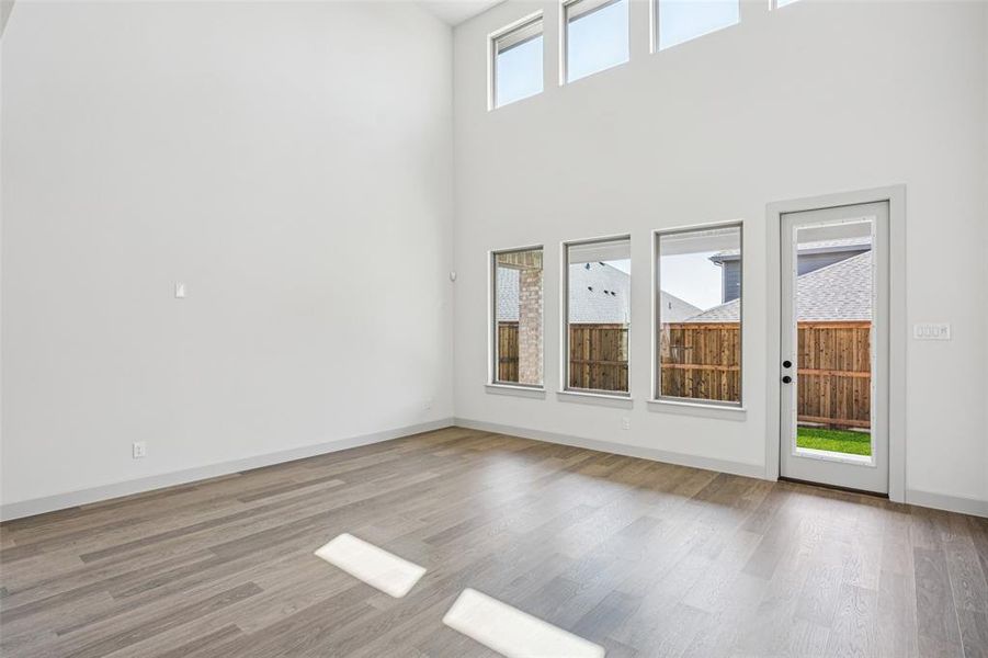With floor to ceiling windows, this home is flooded with natural light both upstairs and down!