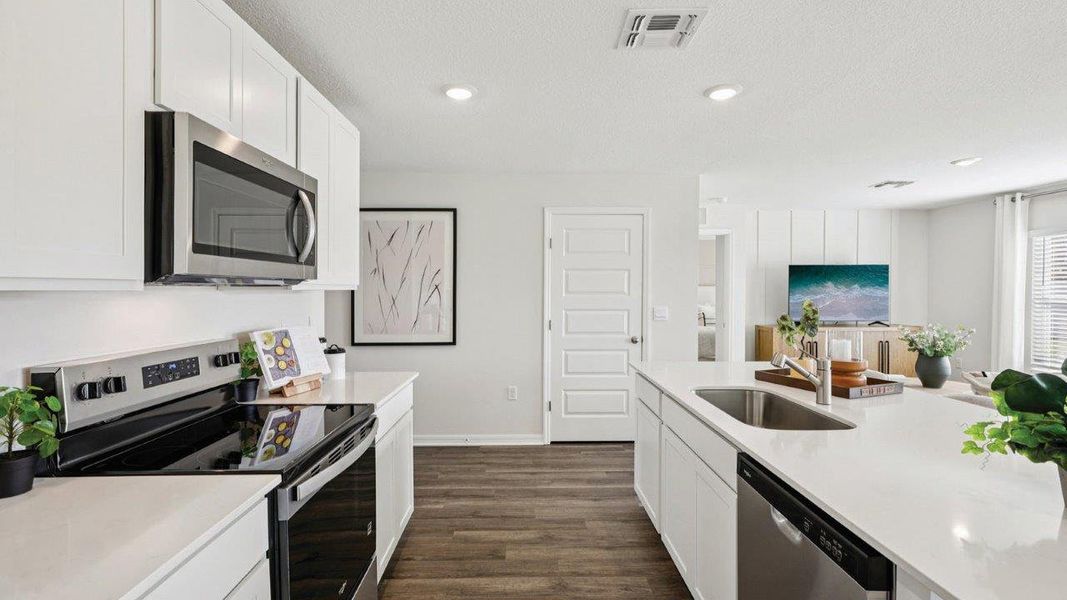 Furnished interior view inside a new home in Leoma's Landing, Lake Wales (Image 18). Furnished interior view inside a new home in Leoma's Landing, Lake Wales (Image 18).