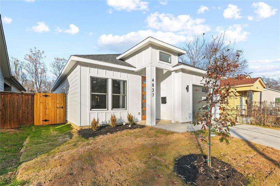 Front exterior of a new home in , Dallas, TX, highlighting curb appeal (Image 15).